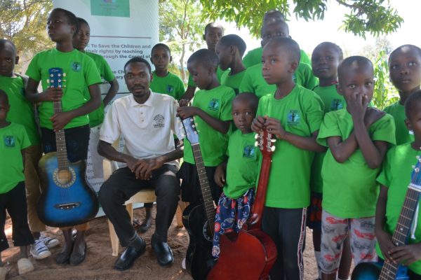 ACSO ADMINSTRATOR, MR. MICHAEL PAMBA WITH THE CHILDREN